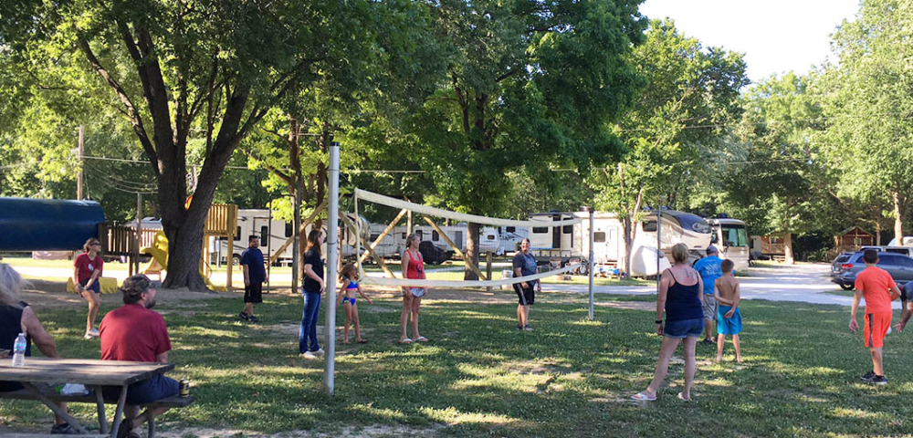 Join in the volleyball game at Pin Oak Creek RV Park in St Louis MO